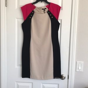 Black/nude/pink sleeveless dress.
